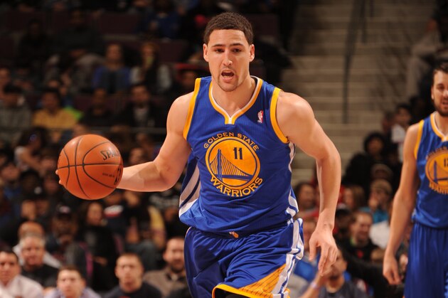 AUBURN HILLS, MI - FEBRUARY 24: Klay Thompson #11 of the Golden State Warriors moves the ball up-court against the Detroit Pistons on February 24, 2014 at The Palace of Auburn Hills in Auburn Hills, Michigan. NOTE TO USER: User expressly acknowledges and agrees that, by downloading and/or using this photograph, User is consenting to the terms and conditions of the Getty Images License Agreement.  Mandatory Copyright Notice: Copyright 2014 NBAE (Photo by Dan Lippitt/NBAE via Getty Images)