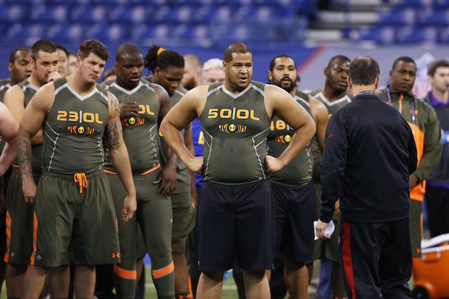 INDIANAPOLIS, IN - FEBRUARY 22: A group of offensive linemen listen to instruction during the 2014 NFL Combine at Lucas Oil Stadium on February 22, 2014 in Indianapolis, Indiana. (Photo by Joe Robbins/Getty Images) INDIANAPOLIS, IN - FEBRUARY 22: A group of offensive linemen listen to instruction during the 2014 NFL Combine at Lucas Oil Stadium on February 22, 2014 in Indianapolis, Indiana. (Photo by Joe Robbins/Getty Images)