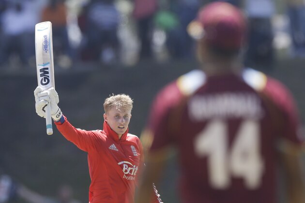England's Joe Root celebrates scoring a century against West Indies during their third one-day international cricket match at the Sir Vivian Richards Cricket Ground in St. John's, Antigua, Wednesday, March 5, 2014. (AP Photo/Ricardo Mazalan)
