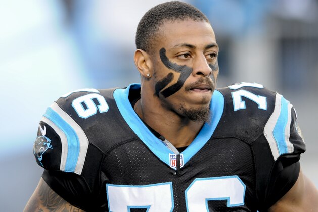 Carolina Panthers defensive end Greg Hardy (76) runs on the the field during player introductions before the start of an NFL football game  in Charlotte, NC, Sunday, Dec. 15, 2013. (AP Photo / Mike McCarn)