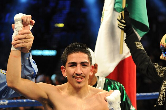 May 4, 2013; Las Vegas, NV, USA; Leo Santa Cruz in the ring after defeating Alexander Munoz (not pictured) during their USBA Junior Featherweight title fight at the MGM Grand Garden Arena. Mandatory Credit: Jayne Kamin-Oncea-USA TODAY Sports May 4, 2013; Las Vegas, NV, USA; Leo Santa Cruz in the ring after defeating Alexander Munoz (not pictured) during their USBA Junior Featherweight title fight at the MGM Grand Garden Arena. Mandatory Credit: Jayne Kamin-Oncea-USA TODAY Sports