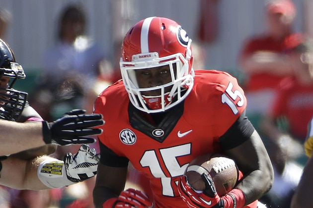 Georgia running back J.J. Green (15) runs against Missouri in the second half of an NCAA college football game Saturday, Oct. 12, 2013 in Athens, Ga., Missouri won 41-26. (AP Photo/John Bazemore) Georgia running back J.J. Green (15) runs against Missouri in the second half of an NCAA college football game Saturday, Oct. 12, 2013 in Athens, Ga., Missouri won 41-26. (AP Photo/John Bazemore)