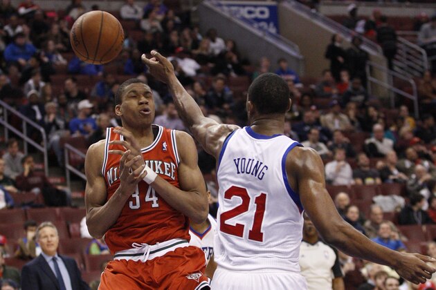 Milwaukee Bucks' Giannis Antetokounmpo, left, of Greece reacts to Philadelphia 76ers' Thaddeus Young, right, knocking the ball away from himduring the second half of an NBA basketball game, Monday, Feb. 24, 2014, in Philadelphia. The Bucks won 130-110. (AP Photo/Chris Szagola)