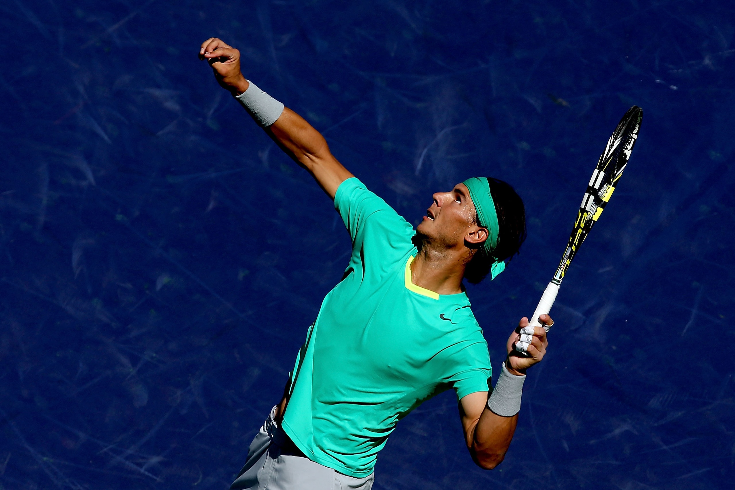 INDIAN WELLS, CA - MARCH 16: Rafael Nadal of Spain serves to Tomas Berdych of Czech Republic during the semifinals of the BNP Paribas Open at the Indian Wells Tennis Garden on March 16, 2013 in Indian Wells, California.  (Photo by Matthew Stockman/Getty Images)