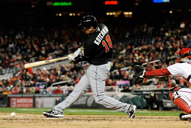 WASHINGTON, DC - APRIL 03:  Casey Kotchman #18 of the Miami Marlins hits a ground ball into a double play in the fifth inning during a game against the Washington Nationals at Nationals Park on April 3, 2013 in Washington, DC.  (Photo by Patrick McDermott/Getty Images)