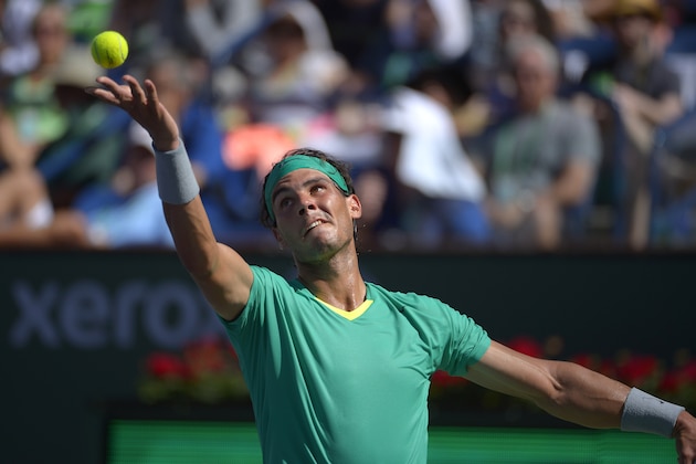 Rafael Nadal, of Spain, serves against Juan Martin del Potro, of Argentina, during their match at the BNP Paribas Open tennis tournament, Sunday, March 17, 2013, in Indian Wells, Calif. (AP Photo/Mark J. Terrill)