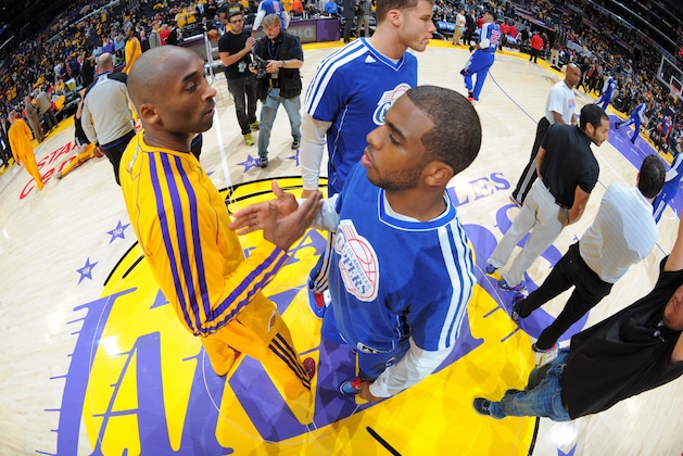 LOS ANGELES, CA - FEBRUARY 14: Kobe Bryant #24 of the Los Angeles Lakers and Chris Paul #3 of the Los Angeles Clippers  greet each other before their game at Staples Center on February 14, 2013 in Los Angeles, California. NOTE TO USER: User expressly acknowledges and agrees that, by downloading and/or using this Photograph, user is consenting to the terms and conditions of the Getty Images License Agreement. Mandatory Copyright Notice: Copyright 2013 NBAE (Photo by Andrew D. Bernstein/NBAE via Getty Images)