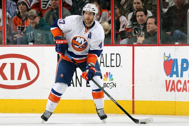 PHILADELPHIA, PA - JANUARY 18:  Andrew MacDonald #47 of the New York Islanders skates the puck against the Philadelphia Flyers on January 18, 2014 at the Wells Fargo Center in Philadelphia, Pennsylvania.  (Photo by Len Redkoles/NHLI via Getty Images)