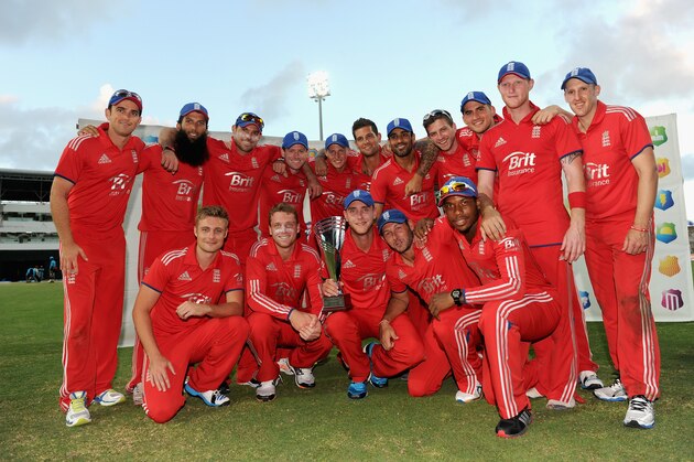 ANTIGUA, ANTIGUA AND BARBUDA - MARCH 05:  England celebrate after winning the 3rd One Day International between the West Indies and England at Sir Viv Richards Cricket Ground on March 5, 2014 in Antigua, Antigua and Barbuda.  (Photo by Gareth Copley/Getty Images)