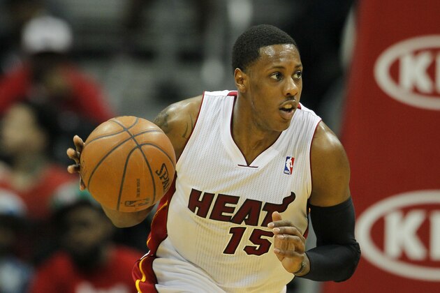 Miami Heat point guard Mario Chalmers (15) drives down court in the second period in an NBA basketball game against the Atlanta Hawks in Atlanta, Monday, Jan. 20, 2014.  Hawks won the game 121-114 (AP Photo/Todd Kirkland)