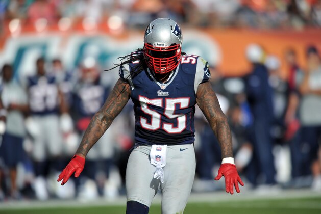 Dec 2, 2012;  Miami, FL, USA; New England Patriots middle linebacker Brandon Spikes (55) reacts during a game against the Miami Dolphins at Sun Life Stadium. Mandatory Credit: Steve Mitchell-USA TODAY Sports