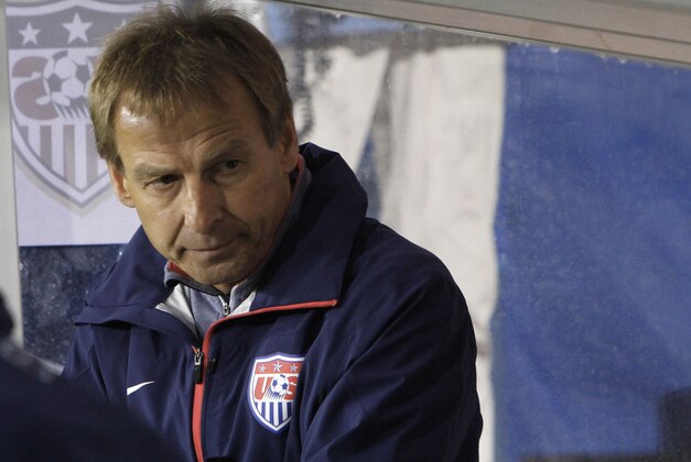 Germans' Juergen Klismann, coach of the U.S. soccer team, is seen during an international friendly match against Ukraine at Antonis Papadopoulos stadium in southern city of Larnaca, Cyprus, Wednesday, March 5, 2014. The Ukrainians are to face the United States in a friendly on Wednesday in Cyprus, a match moved from Kharkiv to Larnaca for security reasons. (AP Photo/Petros Karadjias)
