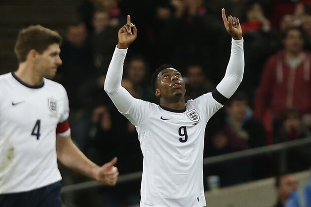 England's Daniel Sturridge, right, celebrates his goal against Denmark, with teammate Steven Gerrard, during the international friendly soccer match between England and Denmark at Wembley Stadium in London, Wednesday, March 5, 2014. (AP Photo/Sang Tan) England's Daniel Sturridge, right, celebrates his goal against Denmark, with teammate Steven Gerrard, during the international friendly soccer match between England and Denmark at Wembley Stadium in London, Wednesday, March 5, 2014. (AP Photo/Sang Tan)
