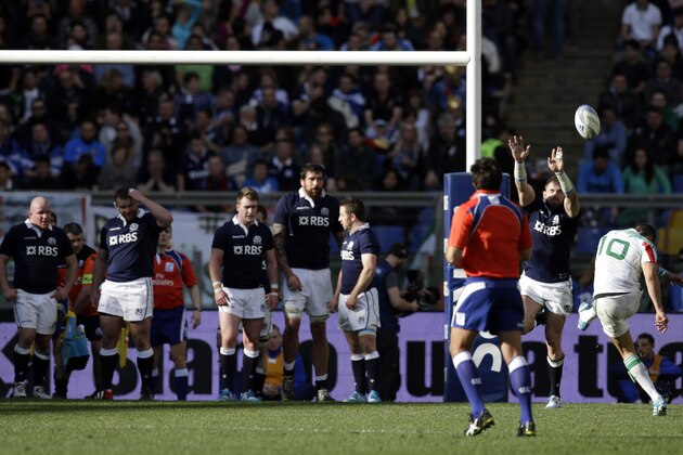 Italy's Tommaso Allan, right, scores on a free kick during a Six Nations rugby union international match between Italy and Scotland, Saturday, Feb. 22, 2014. (AP Photo/Andrew Medichini)