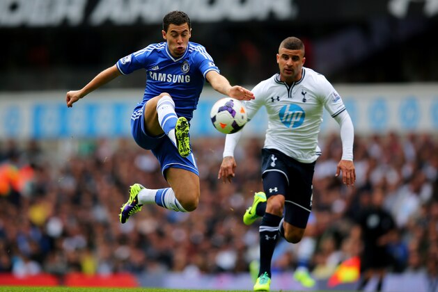 LONDON, ENGLAND - SEPTEMBER 28:  Eden Hazard of Chelsea controls the ball ahead of Kyle Walker of Tottenham Hotspur during the Barclays Premier League match between Tottenham Hotspur and Chelsea at White Hart Lane on September 28, 2013 in London, England.  (Photo by Clive Rose/Getty Images)