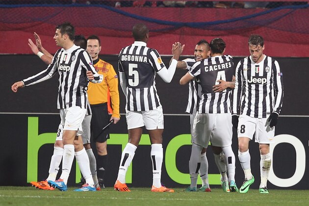 Arturo Vidal of Juventus, third right, celebrates with his teammates after he scored during their Europa League Round of 32 soccer match with Trabzonspor at Avni Aker Stadium in Trabzon, Turkey, Thursday, Feb. 27, 2014. (AP Photo) Arturo Vidal of Juventus, third right, celebrates with his teammates after he scored during their Europa League Round of 32 soccer match with Trabzonspor at Avni Aker Stadium in Trabzon, Turkey, Thursday, Feb. 27, 2014. (AP Photo)