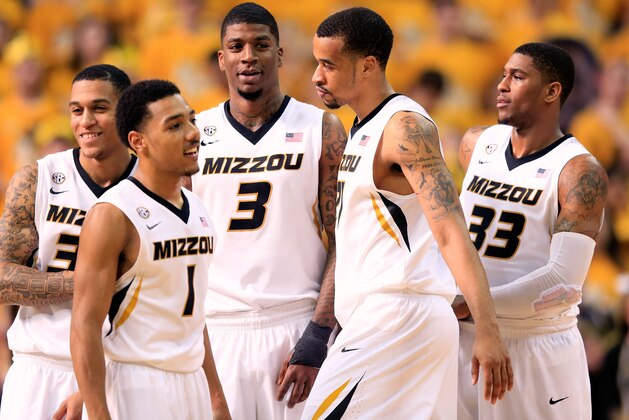 COLUMBIA, MO - FEBRUARY 09:  Jabari Brown #32, Phil Pressey #1, Tony Criswell #3, Laurence Bowers #21, and Earnest Ross #33 of the Missouri Tigers huddle during a timeout in the game against the Mississippi Rebels at Mizzou Arena on February 9, 2013 in Columbia, Missouri.  (Photo by Jamie Squire/Getty Images)