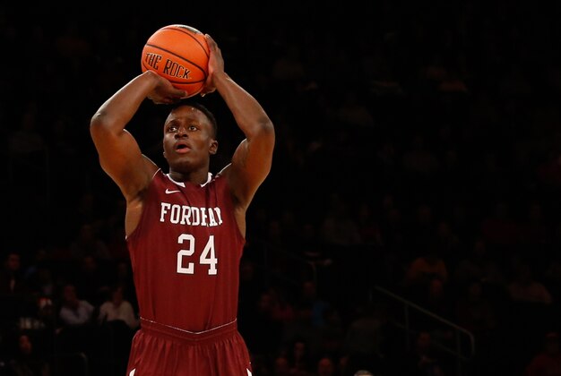Dec 7, 2013; New York, NY, USA;  Fordham Rams guard Bryan Smith (24) shoots during the first half against the St. John's Red Storm at Madison Square Garden. Mandatory Credit: Anthony Gruppuso-USA TODAY Sports