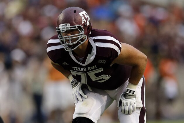 Texas A&M offensive linesman Jake Matthews lines up against Sam Houston State during the second quarter of an NCAA college football game Saturday, Sept. 7, 2013, in College Station, Texas. (AP Photo/David J. Phillip)