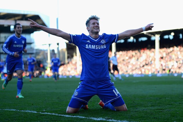 LONDON, ENGLAND - MARCH 01:  Andre Schurrle of Chelsea celebrates as he scores their third goal and completes his hat trickduring the Barclays Premier League match between Fulham and Chelsea at Craven Cottage on March 1, 2014 in London, England.  (Photo by Jamie McDonald/Getty Images)