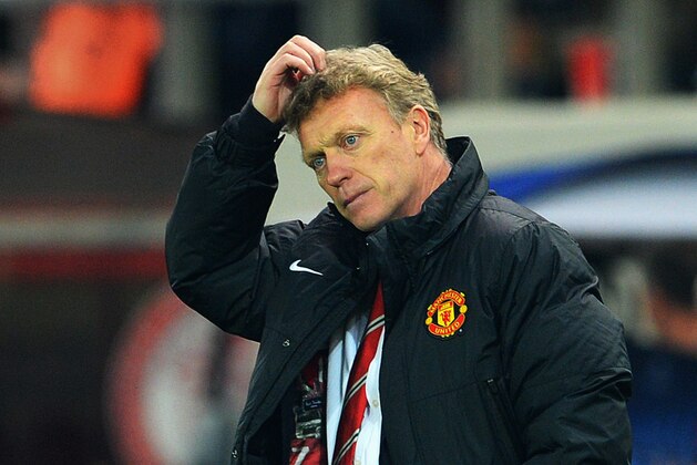 PIRAEUS, GREECE - FEBRUARY 25:  Manchester United manager David Moyes reacts on the touchline during the UEFA Champions League Round of 16 first leg match between Olympiacos FC and Manchester United at Karaiskakis Stadium on February 25, 2014 in Piraeus, Greece.  (Photo by Michael Regan/Getty Images)