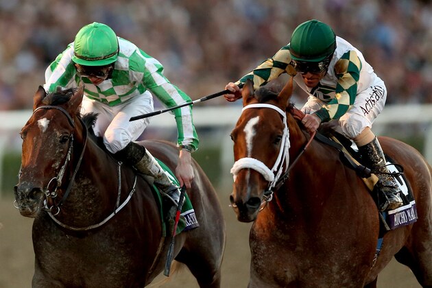 ARCADIA, CA - NOVEMBER 02:  Mucho Macho Man (right), riden by Gary Stevens crosses the finish line ahead of Declaration of War, riden by Joseph O'Brien to win the Breeders' Cup Classic during the 2013 Breeders' Cup World Championships at Santa Anita Park on November 2, 2013 in Arcadia, California.  (Photo by Matthew Stockman/Getty Images)
