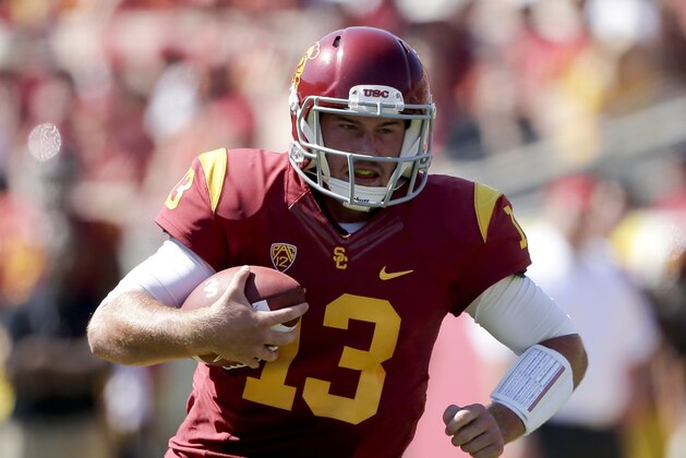 Southern California quarterback Max Wittek runs during the second half of an NCAA college football game against Boston College in Los Angeles, Saturday, Sept. 14, 2013. USC won 35-7. (AP Photo/Chris Carlson)