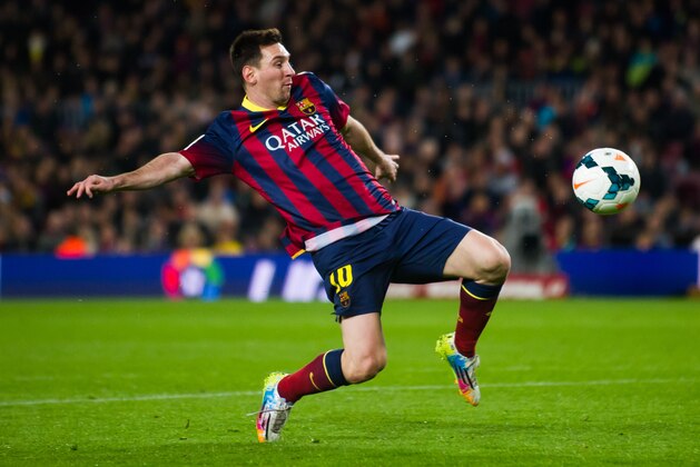 BARCELONA, SPAIN - MARCH 02: Lionel Messi of FC Barcelona tries to reach the ball during the La Liga match between FC Barcelona and UD Almeria at Camp Nou on March 2, 2014 in Barcelona, Spain.  (Photo by Alex Caparros/Getty Images)