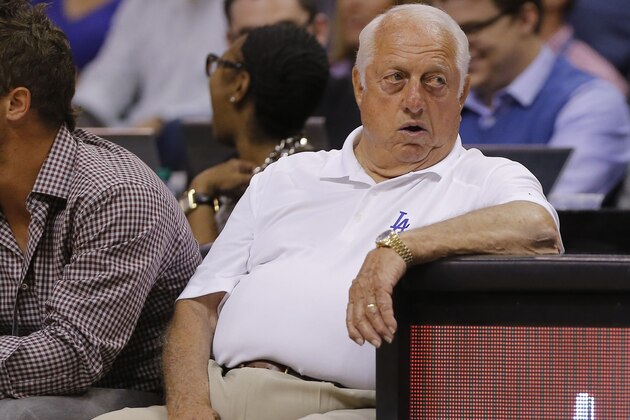 Los Angeles Dodgers' Tommy Lasorda watches the Los Angeles Clippers and Phoenix Suns compete during the first half of an NBA basketball game, Tuesday, March 4, 2014, in Phoenix. (AP Photo/Matt York)