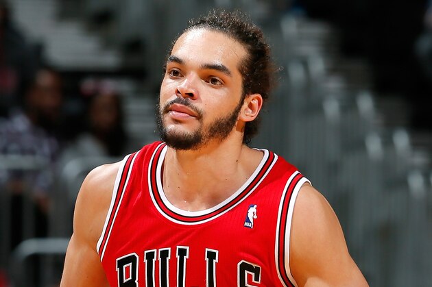 ATLANTA, GA - FEBRUARY 25:  Joakim Noah #13 of the Chicago Bulls reacts after a basket against the Atlanta Hawks at Philips Arena on February 25, 2014 in Atlanta, Georgia.  NOTE TO USER: User expressly acknowledges and agrees that, by downloading and or using this photograph, User is consenting to the terms and conditions of the Getty Images License Agreement.  (Photo by Kevin C. Cox/Getty Images)