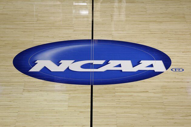 The NCAA logo is shown at half court during practice for second-round games of the NCAA college basketball tournament at The Palace in Auburn Hills, Mich., Wednesday, March 20, 2013. (AP Photo/Paul Sancya) The NCAA logo is shown at half court during practice for second-round games of the NCAA college basketball tournament at The Palace in Auburn Hills, Mich., Wednesday, March 20, 2013. (AP Photo/Paul Sancya)