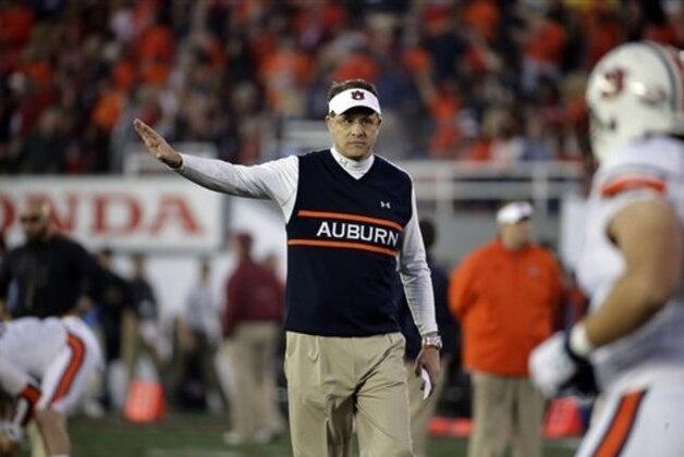 Auburn head coach Gus Malzahnbefore the NCAA BCS National Championship college football game against Florida State Monday, Jan. 6, 2014, in Pasadena, Calif. (AP Photo/Chris Carlson)
