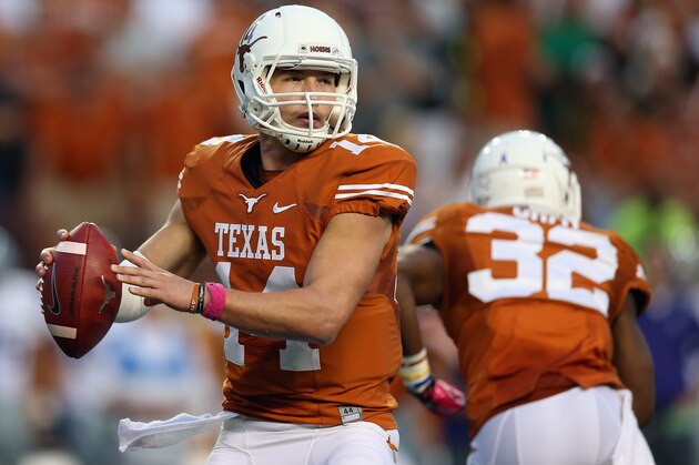 AUSTIN, TX - SEPTEMBER 21:  David Ash #14 of the Texas Longhorns throws against the Kansas State Wildcats at Darrell K Royal-Texas Memorial Stadium on September 21, 2013 in Austin, Texas.  (Photo by Ronald Martinez/Getty Images)