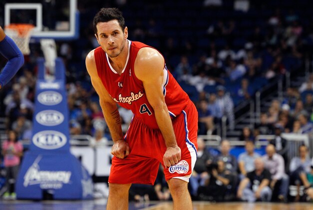 Nov 6, 2013; Orlando, FL, USA; Los Angeles Clippers shooting guard J.J. Redick (4) against the Orlando Magic during the second half at Amway Center. Orlando Magic defeated the Los Angeles Clippers 98-90. Mandatory Credit: Kim Klement-USA TODAY Sports