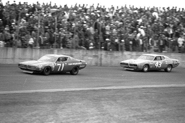 Richard Petty in car 43 chases Buddy Baker in car 71 during the Daytona 500 race February 19, 1973.  Moments before the race ended, Baker withdrew from the race because of engine trouble and Petty went on to an unprecedented fourth victory in the 500.  (AP Photo)