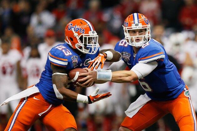 NEW ORLEANS, LA - JANUARY 02:  Jeff Driskel #6 of the Florida Gators and Mike Gillislee #23 of the Florida Gators run a play during the Allstate Sugar Bowl at Mercedes-Benz Superdome on January 2, 2013 in New Orleans, Louisiana.  (Photo by Kevin C. Cox/Getty Images)