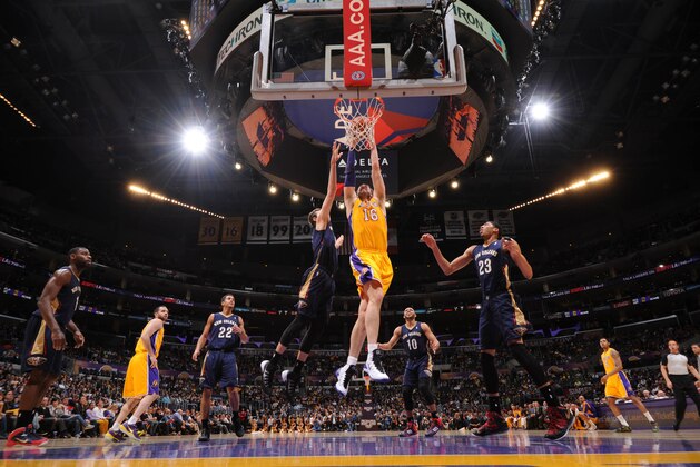 LOS ANGELES, CA - MARCH 4: Pau Gasol #16 of the Los Angeles Lakers goes up for a dunk against the New Orleans Pelicans at Staples Center on March 4, 2014 in Los Angeles, California. NOTE TO USER: User expressly acknowledges and agrees that, by downloading and/or using this Photograph, user is consenting to the terms and conditions of the Getty Images License Agreement. Mandatory Copyright Notice: Copyright 2014 NBAE (Photo by Andrew D. Bernstein/NBAE via Getty Images)