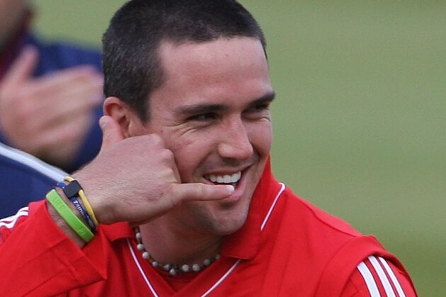 MANCHESTER, UNITED KINGDOM - JUNE 12:  Kevin Pietersen of England takes a pretend phone call during nets at Old Trafford Cricket Ground on June 12, 2008 in Manchester, England.  (Photo by Hamish Blair/Getty Images)