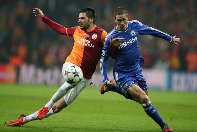 Hakan Balta of Galatasaray, left, and Fernando Torres of Chelsea fight for the ball during their Champions League Round of 16, First Leg soccer match between Galatasaray and Chelsea at Turk Telekom Arena Stadium in Istanbul, Turkey, Wednesday, Feb. 26, 2014. (AP Photo) Hakan Balta of Galatasaray, left, and Fernando Torres of Chelsea fight for the ball during their Champions League Round of 16, First Leg soccer match between Galatasaray and Chelsea at Turk Telekom Arena Stadium in Istanbul, Turkey, Wednesday, Feb. 26, 2014. (AP Photo)