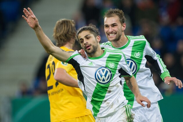 Hoffenheim's Ricardo Rodriguez, left, and Bas Dost celebrate their side's second goal during a German soccer cup quarterfinal match between TSG 1899 Hoffenheim and VFL Wolfsburg in Sinsheim, Germany, Wednesday, Feb. 12, 2014. (AP Photo/dpa,Uwe Anspach) Hoffenheim's Ricardo Rodriguez, left, and Bas Dost celebrate their side's second goal during a German soccer cup quarterfinal match between TSG 1899 Hoffenheim and VFL Wolfsburg in Sinsheim, Germany, Wednesday, Feb. 12, 2014. (AP Photo/dpa,Uwe Anspach)