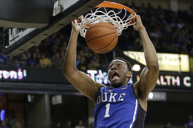 Duke's Jabari Parker (1)  dunks against Wake Forest during the second half of an NCAA college basketball game in Winston-Salem, N.C., Wednesday, March 5, 2014. Wake Forest won 82-72. (AP Photo/Chuck Burton)