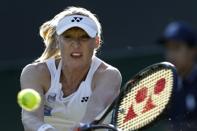 FILE - This is a Thursday June 28, 2012 file photo of Elena Baltacha of Britain as she returns a shot  to Petra Kvitova of the Czech Republic during a second round women's singles match at the All England Lawn Tennis Championships at Wimbledon, England. Former top-50 professional tennis player Elena Baltacha says she has been diagnosed with cancer of the liver.  In a statement on the British tennis federation's website Friday, March 7, 2014, the 30-year-old Baltacha says she is