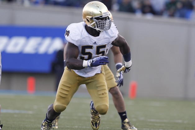 Notre Dame linebacker Prince Shembo follows play against Air Force in the third quarter of Notre Dame's 45-20 victory in an NCAA football game at the Air Force Academy, Colo., on Saturday, Oct. 26, 2013. (AP Photo/David Zalubowski)