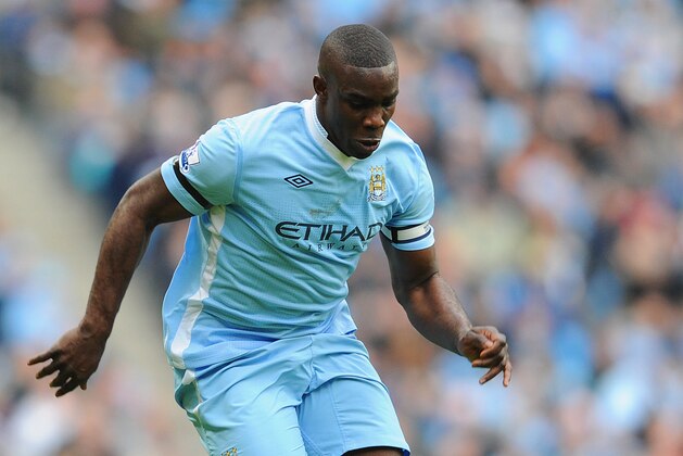 MANCHESTER, ENGLAND - JANUARY 22:  Micah Richards of Manchester City in action during the Barclays Premier League match between Manchester City and Tottenham Hotspur at the Etihad Stadium on January 22, 2012 in Manchester, England.  (Photo by Michael Regan/Getty Images)