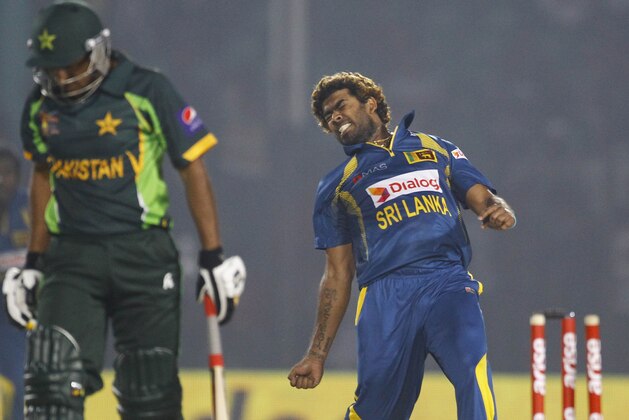 Sri Lanka’s Lasith Malinga, right, celebrates taking the wicket of Pakistan’s Bilawal Bhatti during the opening match of the Asia Cup one-day international cricket tournament between them in Fatullah, near Dhaka, Bangladesh, Tuesday, Feb. 25, 2014. (AP Photo/A.M. Ahad) Sri Lanka’s Lasith Malinga, right, celebrates taking the wicket of Pakistan’s Bilawal Bhatti during the opening match of the Asia Cup one-day international cricket tournament between them in Fatullah, near Dhaka, Bangladesh, Tuesday, Feb. 25, 2014. (AP Photo/A.M. Ahad)