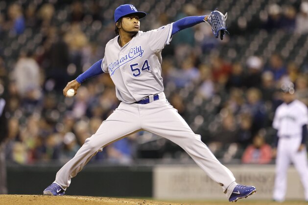 Kansas City Royals starting pitcher Ervin Santana throws against the Seattle Mariners a baseball game Wednesday, Sept. 25, 2013, in Seattle. (AP Photo/Elaine Thompson)