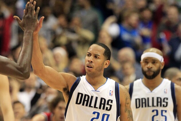 Dallas Mavericks guard Devin Harris (20) celebrates after scoring the go-ahead points during the second half of the  Mavericks' 103-98 win over the Portland Trail Blazers, Friday, March 7, 2014, in Dallas. (AP Photo/John F. Rhodes)