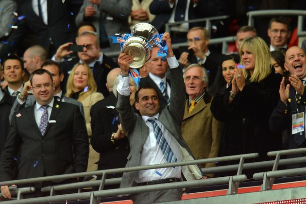 LONDON, ENGLAND - MAY 11:  Manager Roberto Martinez of Wigan Athletic lifts the trophy following his team's 1-0 victory during the FA Cup with Budweiser Final between Manchester City and Wigan Athletic at Wembley Stadium on May 11, 2013 in London, England.  (Photo by Shaun Botterill/Getty Images)