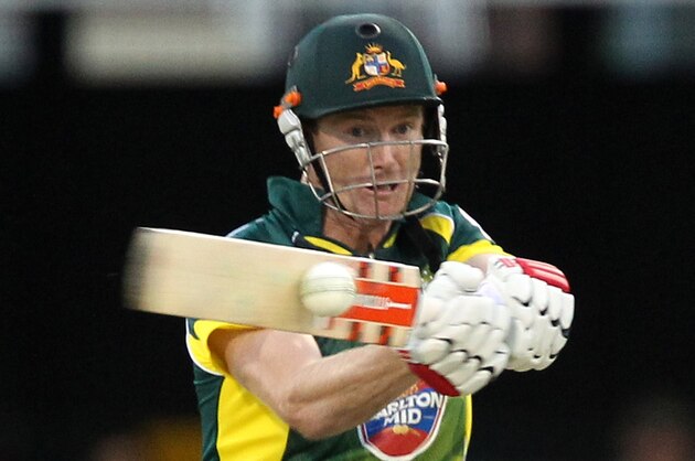 Australia's George Bailey plays a shot during the second One Day International cricket match against England at the Gabba cricket ground in Brisbane, Australia, Friday, Jan. 17, 2014. (AP Photo/Tertius Pickard)