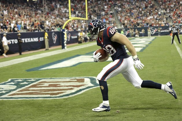 Houston Texans tight end Garrett Graham (88) makes a 33-yard touchdown reception against the Miami Dolphins during the second half of a preseason NFL football game, Saturday, Aug. 17, 2013, in Houston. (AP Photo/Eric Gay)